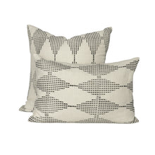 Load image into Gallery viewer, Two hand blocked diamond design charcoal coloured cushion covers on a bench