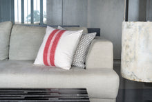Load image into Gallery viewer, Hand block printed red coloured cotton cushion cover printed on an ivory base fabric placed next to a block printed grey coloured cushion cover