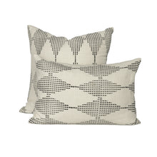 Load image into Gallery viewer, Two hand blocked diamond design charcoal coloured cushion covers on a bench
