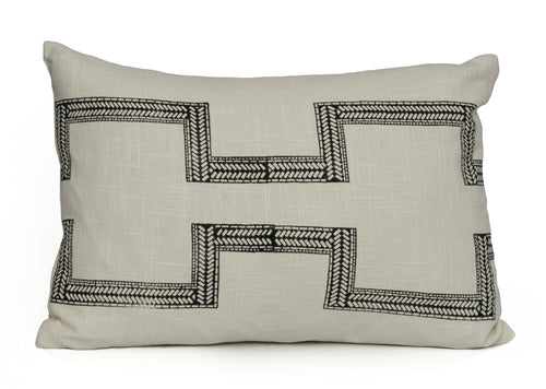 Hand blocked cotton lumbar cushion cover in a charcoal colour on an ivory cotton fabric