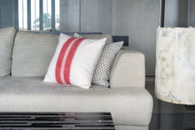 Load image into Gallery viewer, Hand block printed red coloured cotton cushion cover printed on an ivory base fabric placed next to a block printed grey coloured cushion cover
