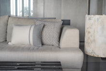 Load image into Gallery viewer, Hand woven woollen cushion cover in grey and beige placed next to a block printed grey cushion cover on a couch
