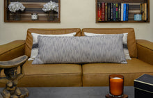 Load image into Gallery viewer, Hand woven cotton extra long lumbar cushion cover in a navy blue colour placed in front of two block printed cushion covers on a couch
