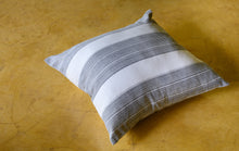 Load image into Gallery viewer, Lifestyle shot of a Block printed charcoal striped cushion cover on a mustard floor
