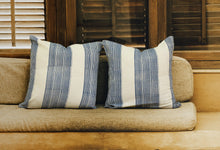 Load image into Gallery viewer, Mood shot of blue striped block printed sham cushion covers on a sofa
